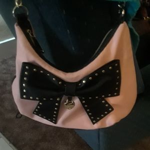 Pink and black purse